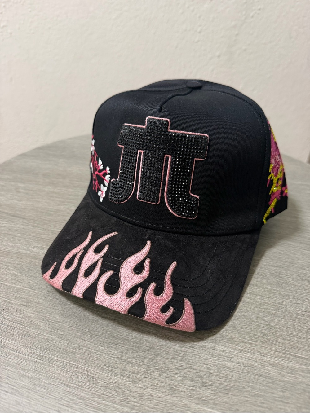 “Malvados” Black Baseball Cap with Pink Flame & Embellished Symbol